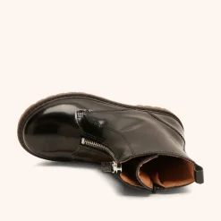 nora black polido